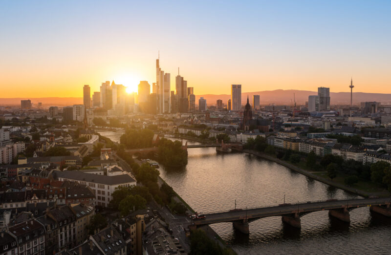 Sunset view of the business disctict in Frankfurt at the main river. ideal for websites and magazines layouts